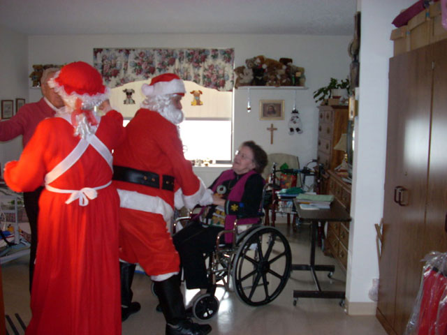 Dad and Marge play Santa and Mrs Claus