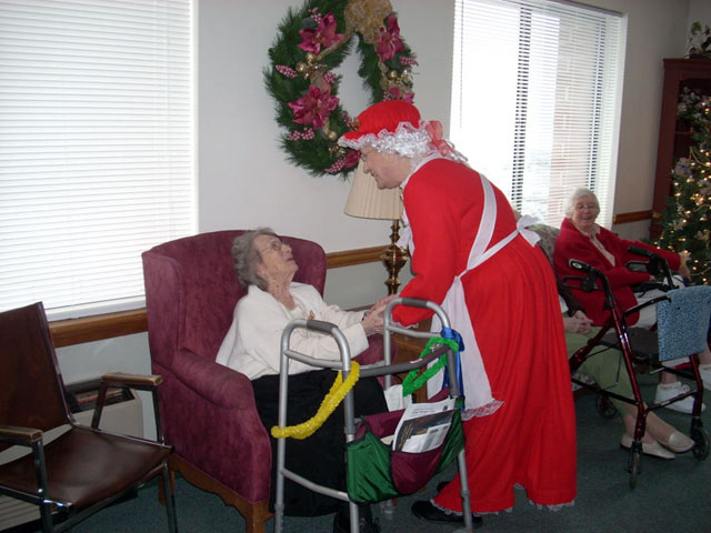 Dad and Marge play Santa and Mrs Claus