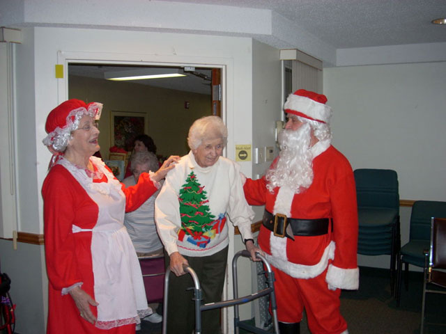Dad and Marge play Santa and Mrs Claus
