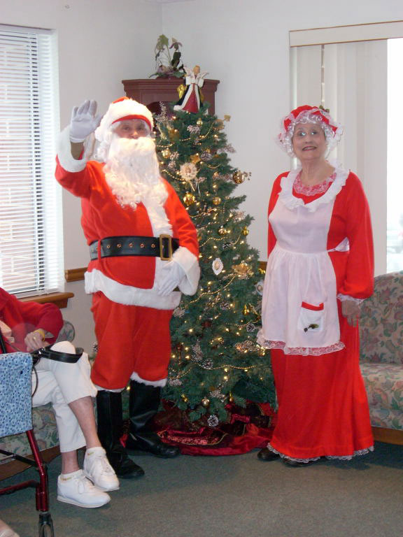 Dad and Marge play Santa and Mrs Claus