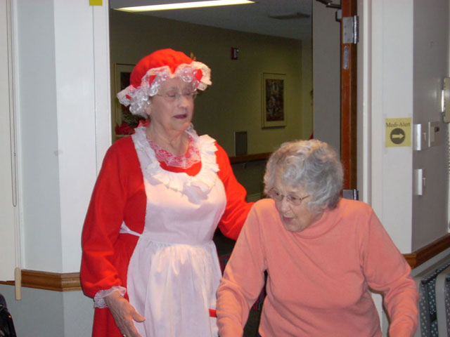 Dad and Marge play Santa and Mrs Claus