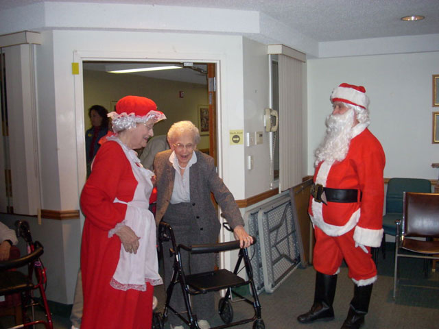 Dad and Marge play Santa and Mrs Claus