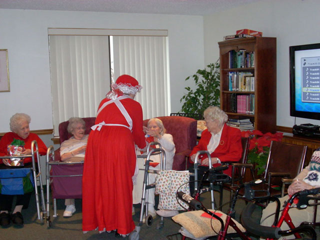 Dad and Marge play Santa and Mrs Claus
