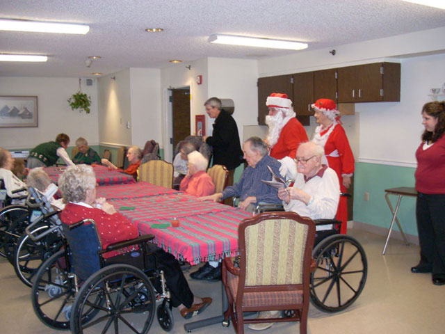 Dad and Marge play Santa and Mrs Claus