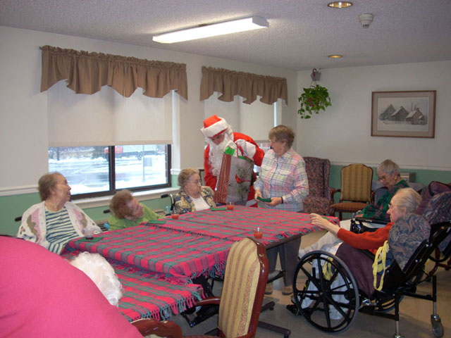 Dad and Marge play Santa and Mrs Claus